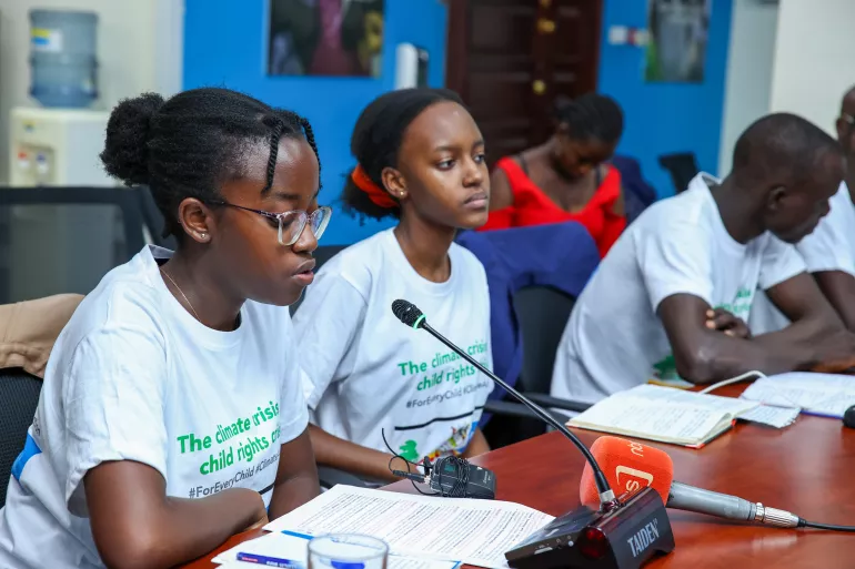 Valerie Naluyima, a youth climate change activist speaks at the presentation of a statement on Climate Action for the Africa Climate Summit delegates representing Uganda, at the UNICEF Uganda head office.