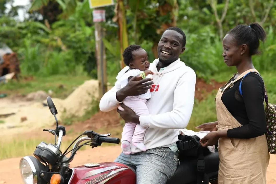 Brian Egesa, 26, takes his wife to the outreach centre for their daughter&rsquo;s scheduled immunization, goes to work as a boda-boda rider, then returns to pick them one hour later. He carries his daughter while his wife finds a comfortable sitting position at the back of the motorbike. &ldquo;I am glad I don&rsquo;t have to walk back home,&rdquo; Brian&rsquo;s wife says with a wide smile.