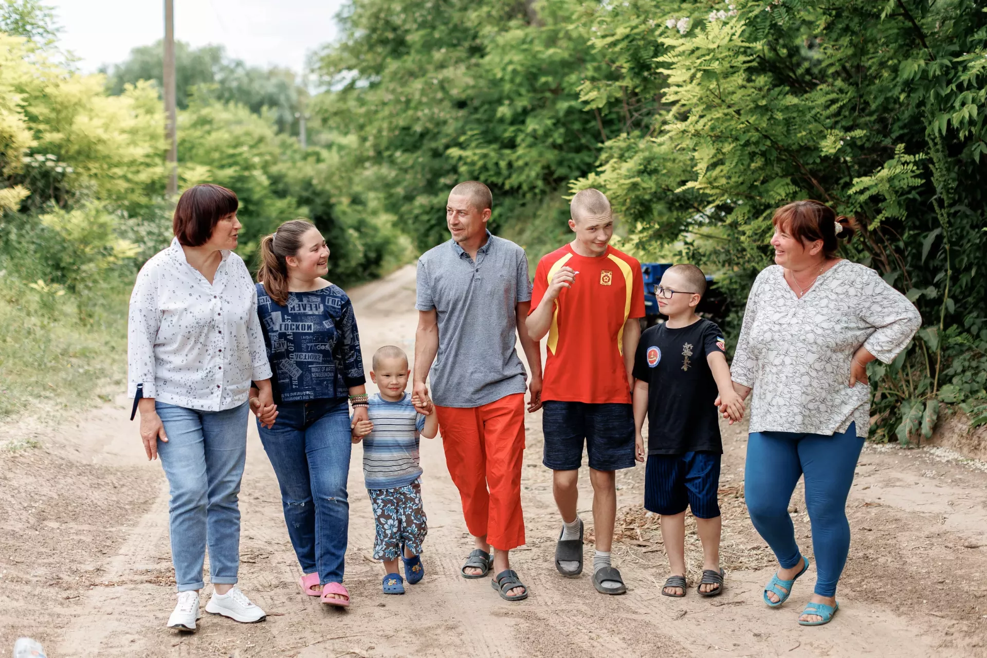 The Bokshiv family: Ruslan and Svitlana and their children Dmytro (15 years old), Diana (13 years old), Danylo (9 years old), David (5 years old) and Natalia Gavrylenko, head of the children's service of the executive committee of the Khorolsk City Council