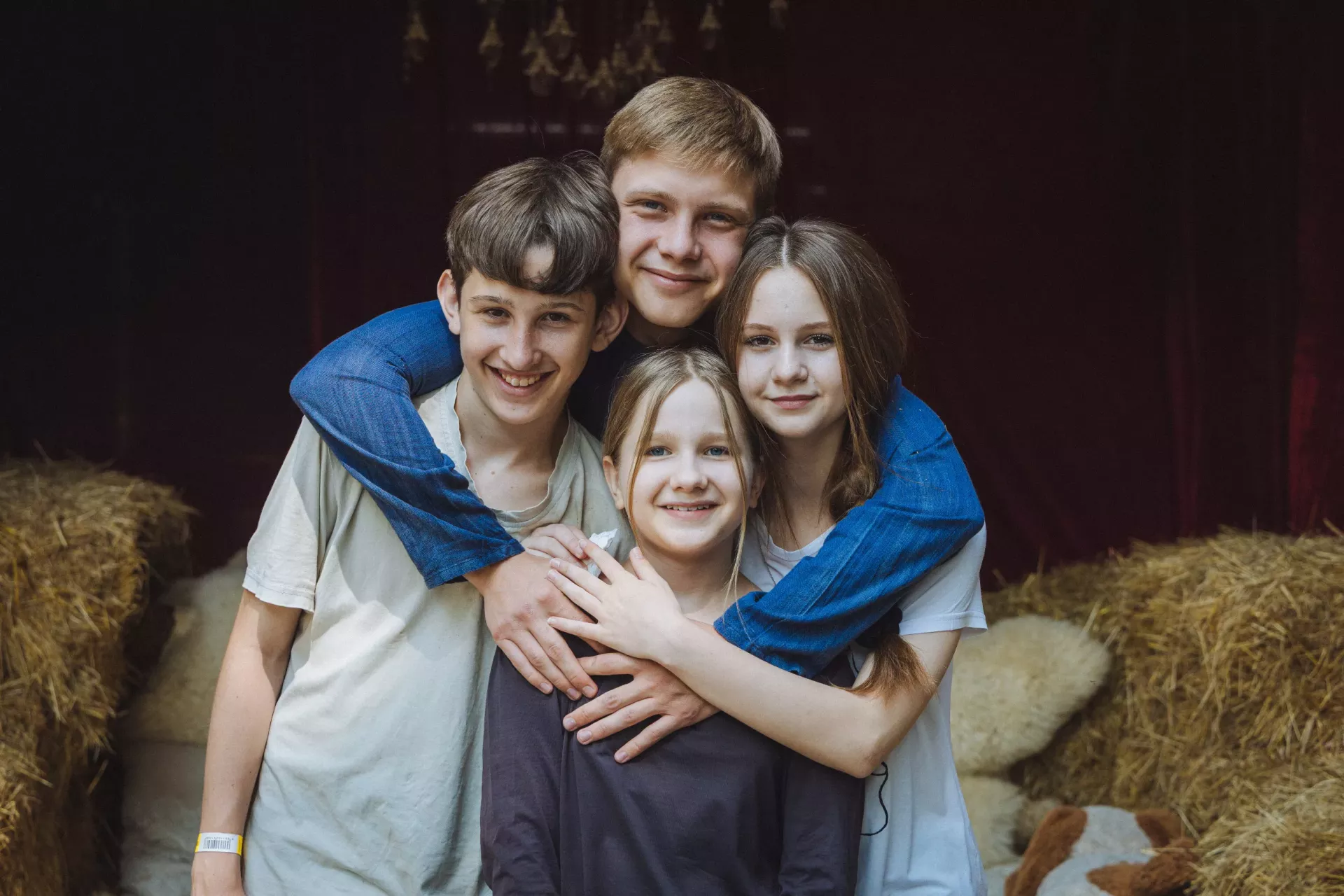 Viacheslav (21), Nikol (14), Tymur (13) and Olivia (11) in Uzhhorod (Zakarpatska region, Ukraine) in June 2025. After the death of their mother as a result of shelling in March 2022 in the Donetsk region, the older brother Viacheslav became the guardian of four younger siblings (another brother, Danylo (19), currently lives and studies in Kyiv).