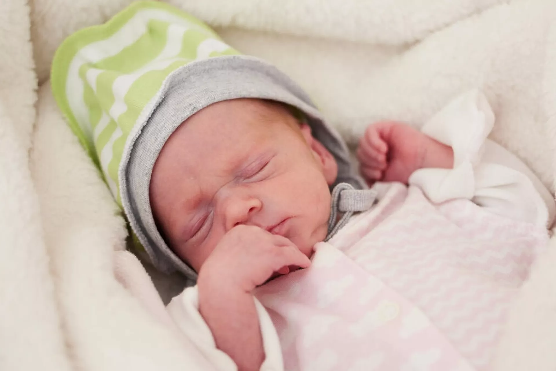 On 24 March 2022 in Ukraine, newborn Veronika sleeps in a cot at the Lviv Perinatal Centre, next to her mother, Iryna (not pictured).