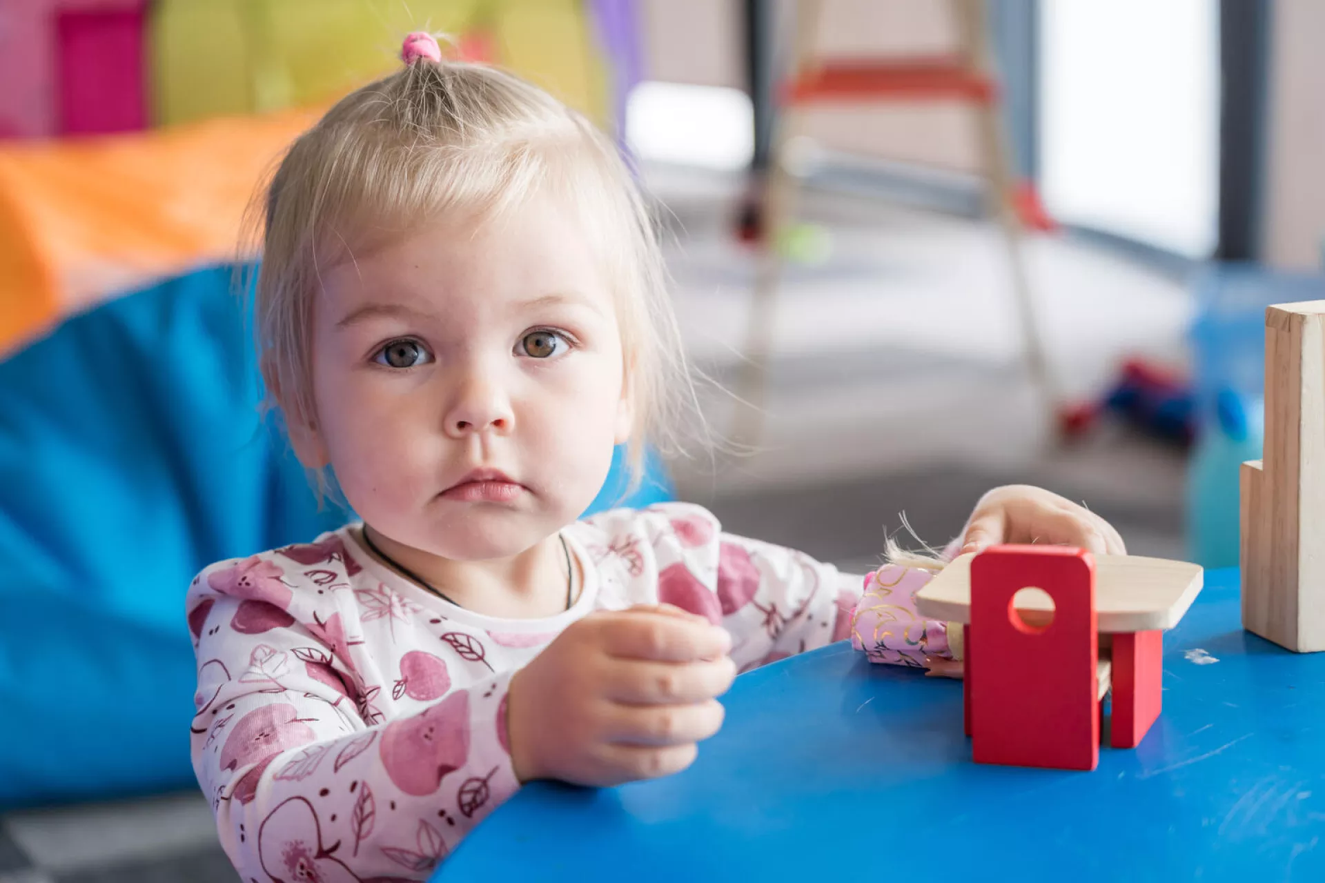 On 19 April 2022, a child plays in the activity room in the Centrul de Afaceri, Transfer Tehnologic si Incubator de Afaceri (C.A.T.T.I.A) in Brasov, Romania, during the visit of President and CEO of UNICEF USA Michael Nyenhuis to the center.