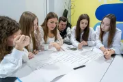 School students sitting at the lesson