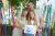 Dad, mom and daughter happily hold the picture they created together. They take part in a family festival from upshifters