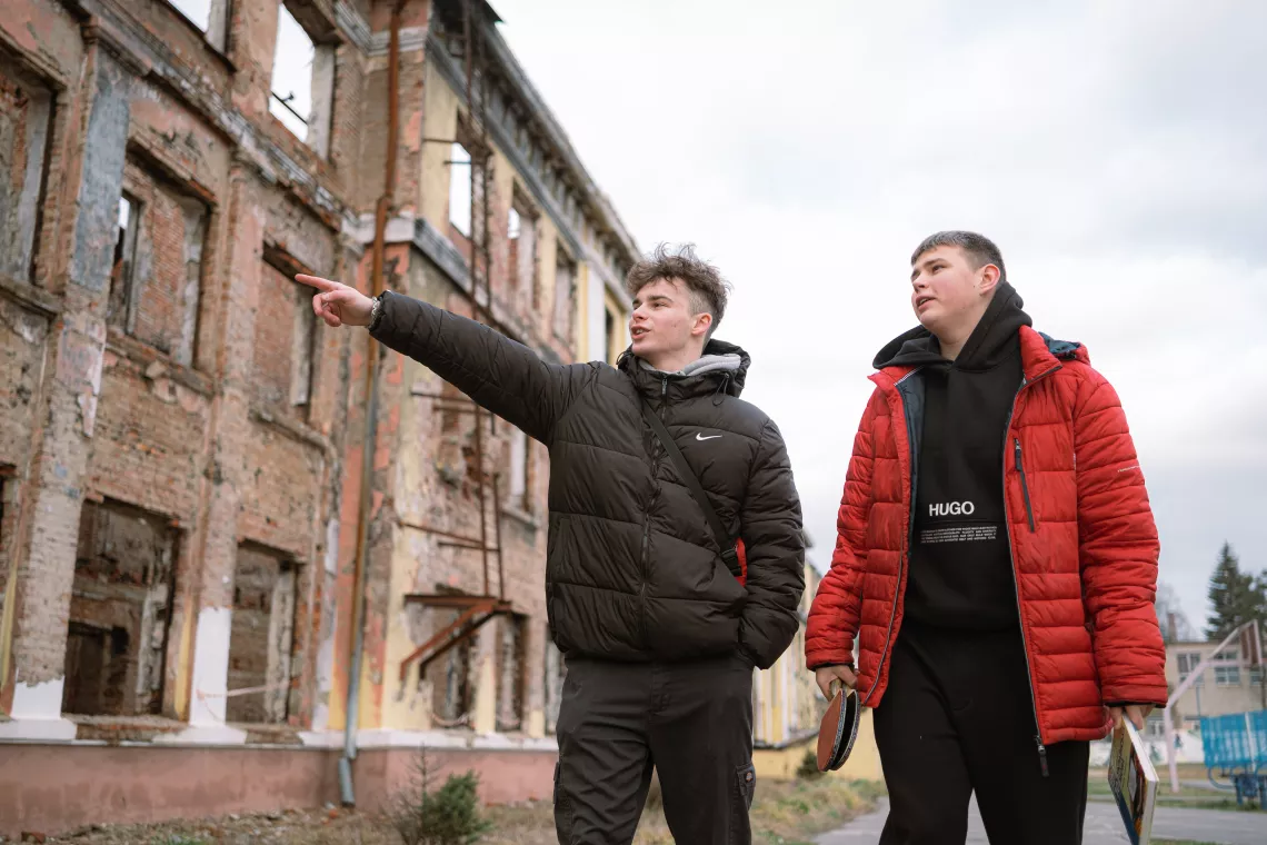 15-year-old Stepan and 16-year-old Yaroslav walk around the school yard and fantasize about how it could be restored. The boys dream of returning to their desks in the next academic year, however, due to the security situation, they are unlikely to be able to do so.