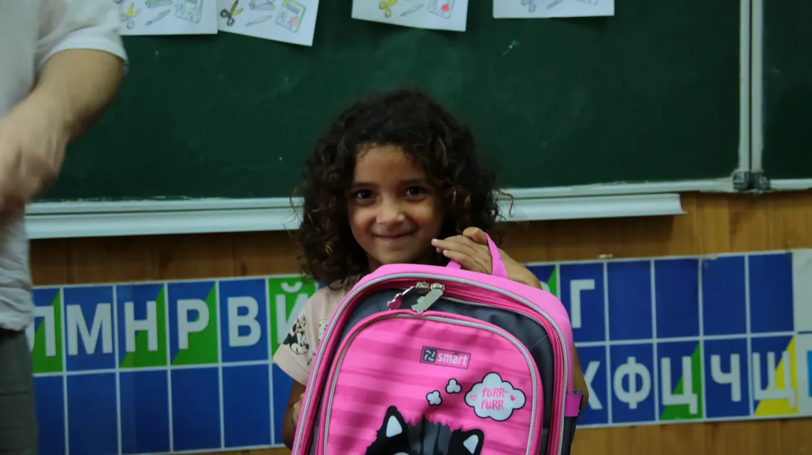 A girl with a backpack