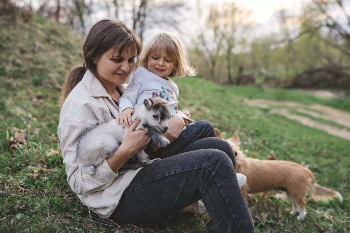 Hanna holds her 3-year-old son Leonard at their temporary house in Kmelnytskyi oblast. The family used to have an apartment in Irpin, in a house, which is now half-destroyed. But when the war started they had to flee.