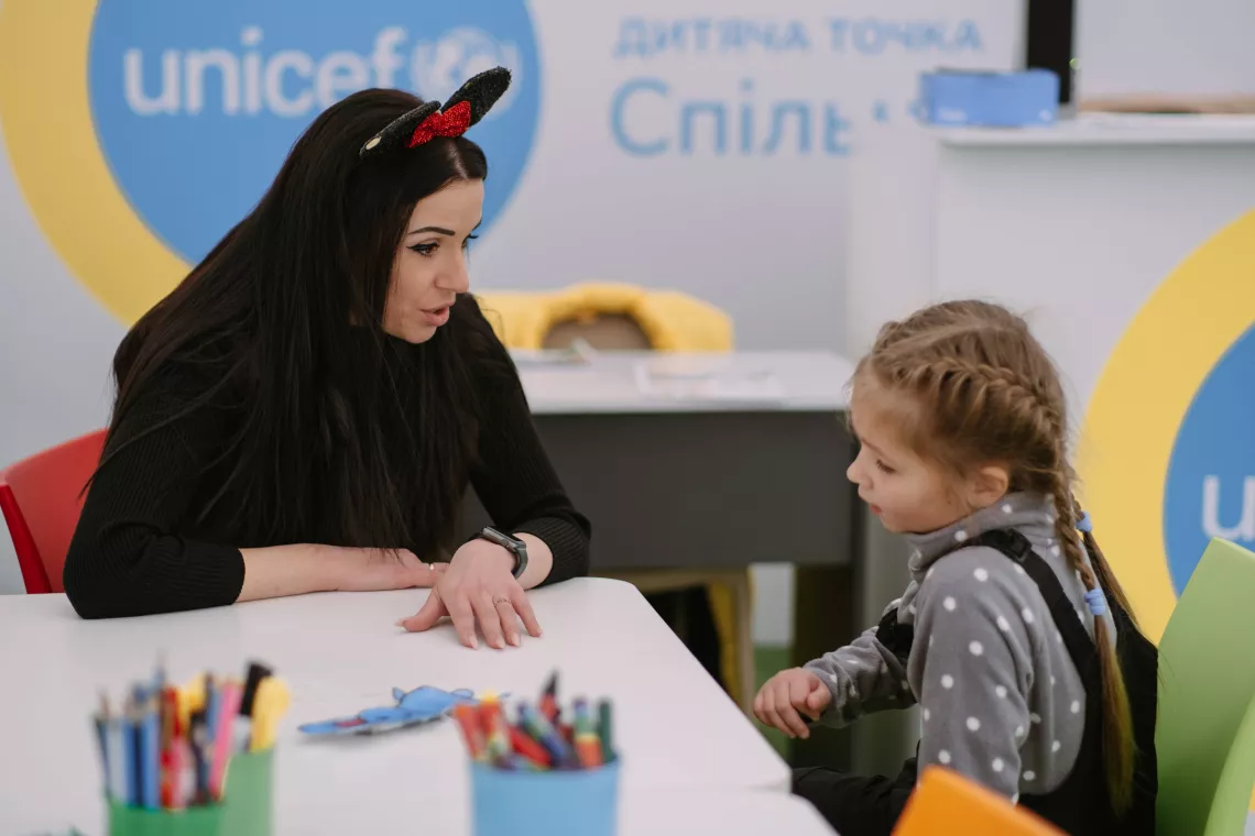 Olena, administrator of the Spilno Child Spot in Balaklia, meets the first children who came to the meeting