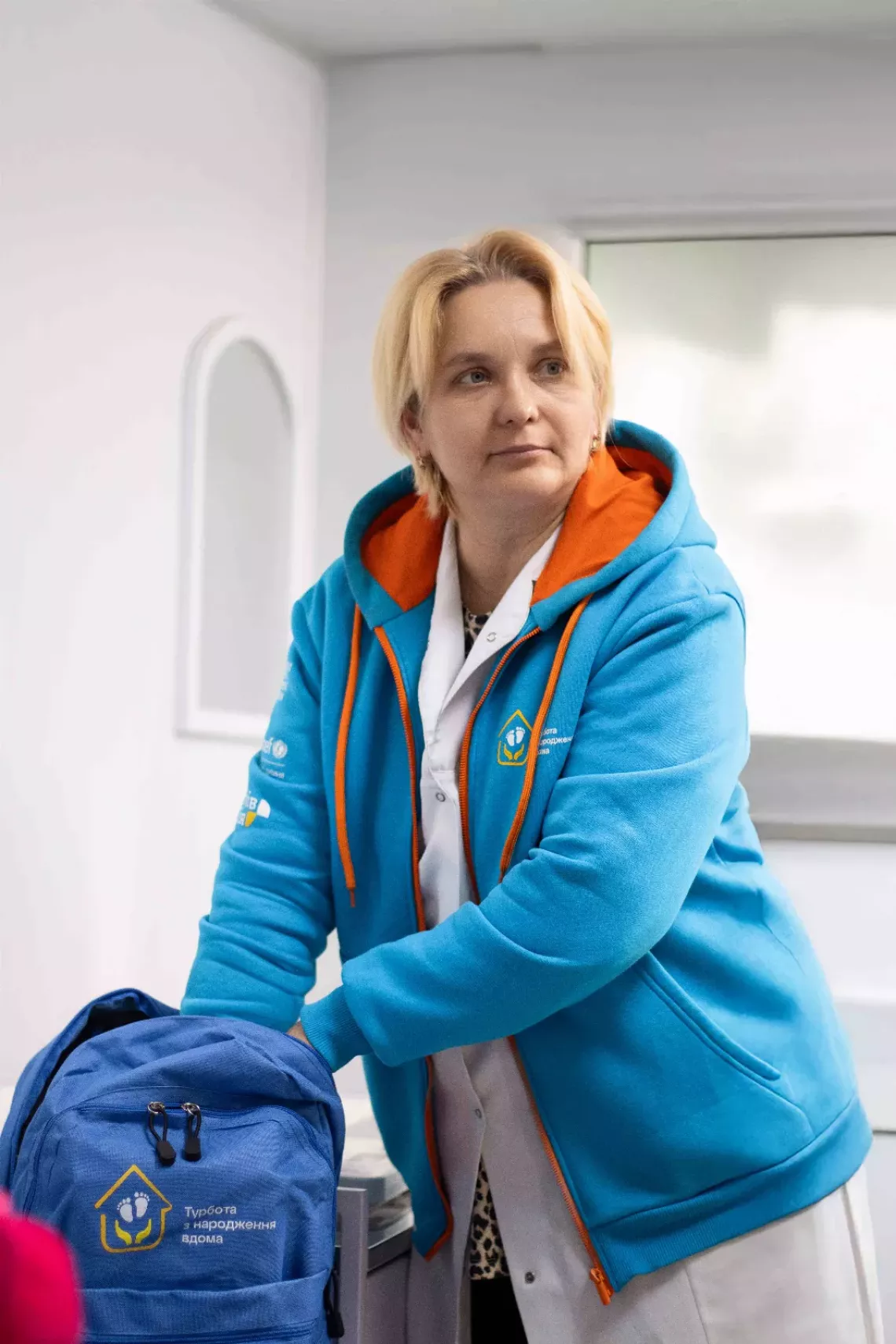 Family nurse Lesya Tytychko packs a backpack