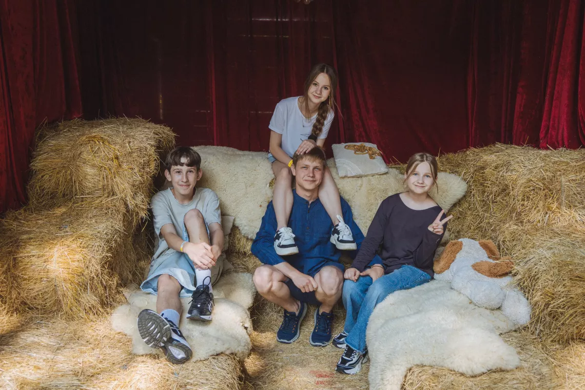 Viacheslav (21), Nicole (14), Tymur (13) and Olivia (11)