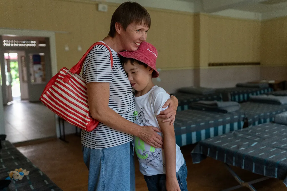 47‑year‑old accountant Maria with her son, 9-years old Sashko