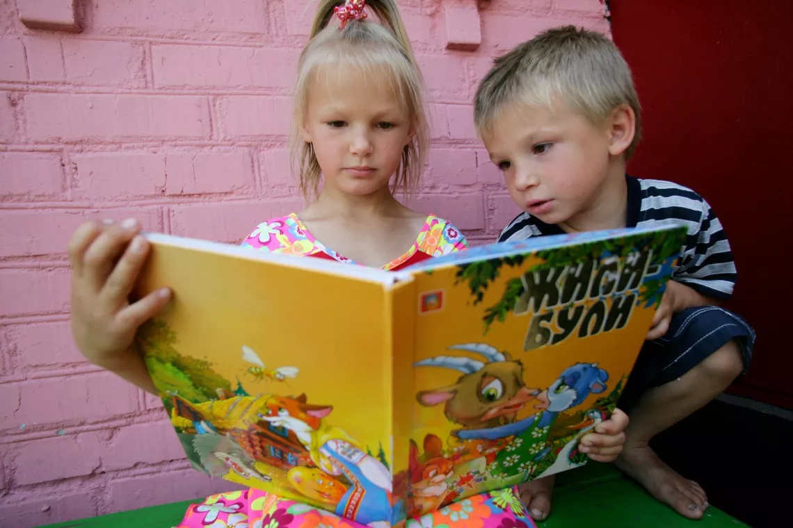 Brother and sister reading