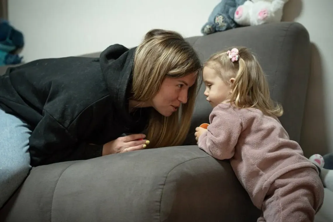 Two-year-old Eva with her mother, Daryna