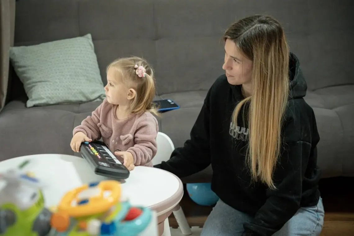 Two-year-old Eva with her mother, Daryna