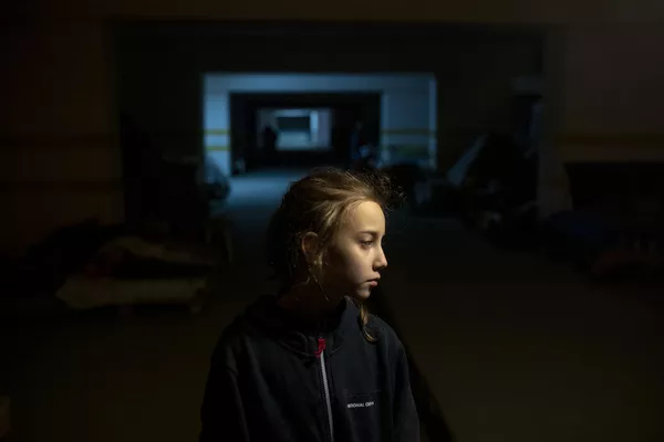 Alina aged nine from the northeastern city of Kharkiv stands in the underground car park, where, along with her parents and a few other families, they have been sheltering from the air attacks and shelling above. "I have sad days, middle-sad days, but there are no wonderful days," she says.