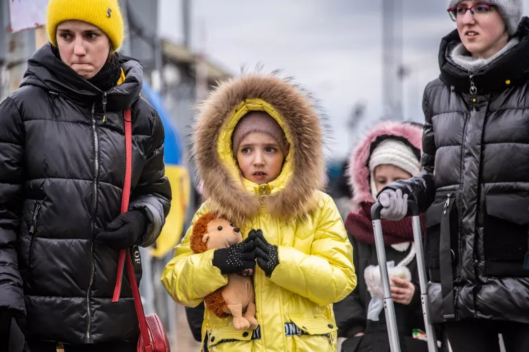 Ukraine. Families arrive in Berdyszcze, Poland, after crossing the border from Ukraine.
