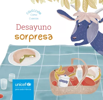 Tapa del cuento &ldquo;Desayuno sorpresa&rdquo;, con la ilustraci&oacute;n de un picnic con una pascualina y una canasta de frutas, agua y galletas. Al costado se asoma una cabra.