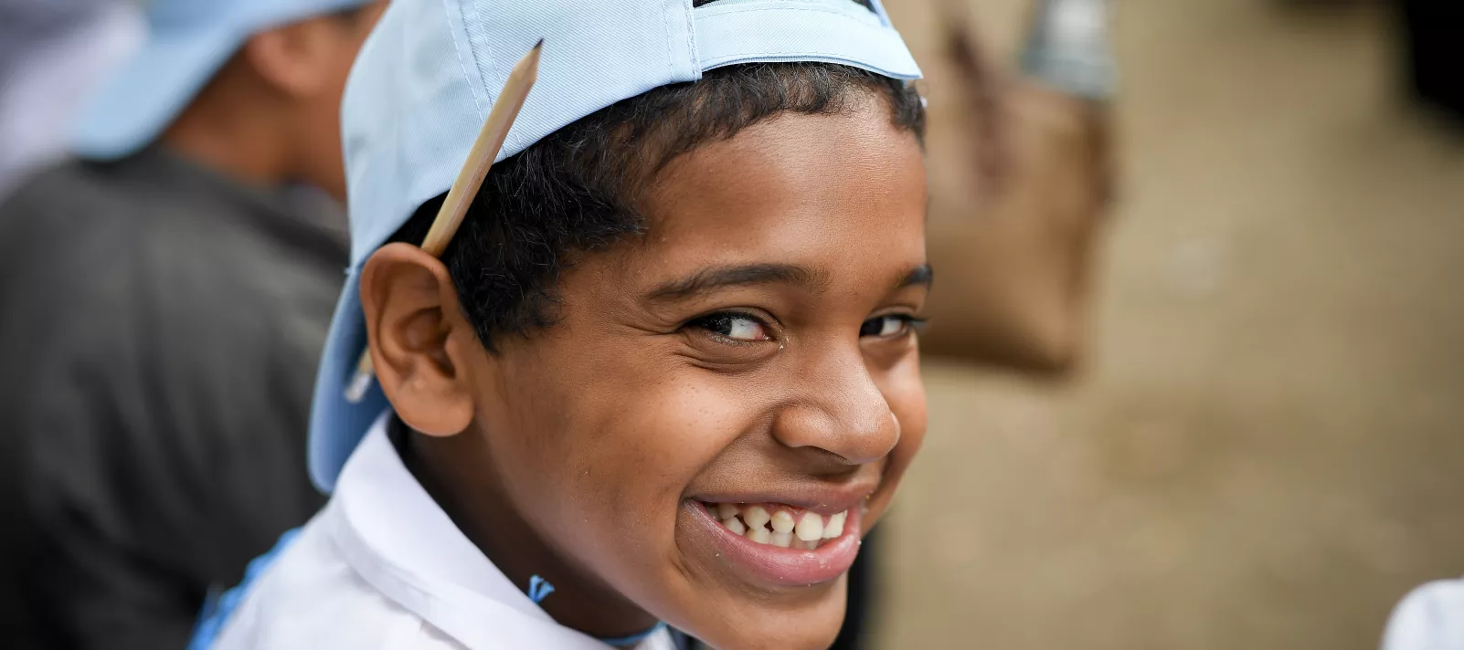 Ni&ntilde;o sonr&iacute;e a c&aacute;mara, en el Segundo Congreso de Ni&ntilde;os y Ni&ntilde;as por una Educaci&oacute;n Inclusiva, realizado en octubre de 2018.