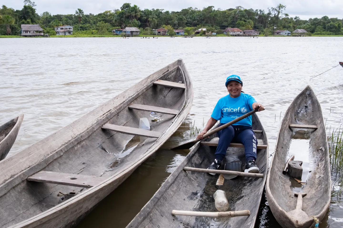 Mar&iacute;a Torres, a consultant with the indigenous community of Warao, smiles for the camera on board a curiara (artisanal boat) in the Orinoco River in San Francisco de Guayo on the Delta Amacuro State on 21 March 2023.