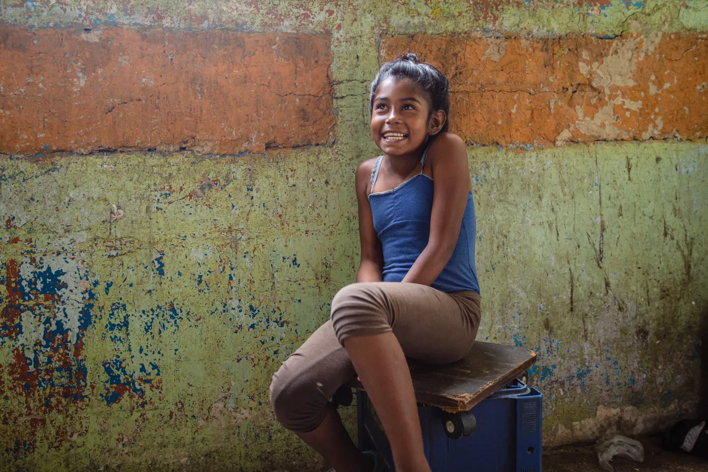 9-year-old Duglianis Gonz&aacute;lez S&aacute;nchez in her house in the community of Petare, Caracas, Venezuela. Water, sanitation and hygiene are essential for the survival and development of children and their families. In the most vulnerable communities of Venezuela, access, quantity, continuity and water quality are the main concerns. This situation is aggravated with the power outages in recent months.
