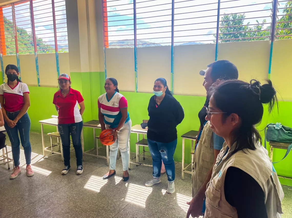 Teachers participate in a socio-emotional support dynamic provided by UNICEF.