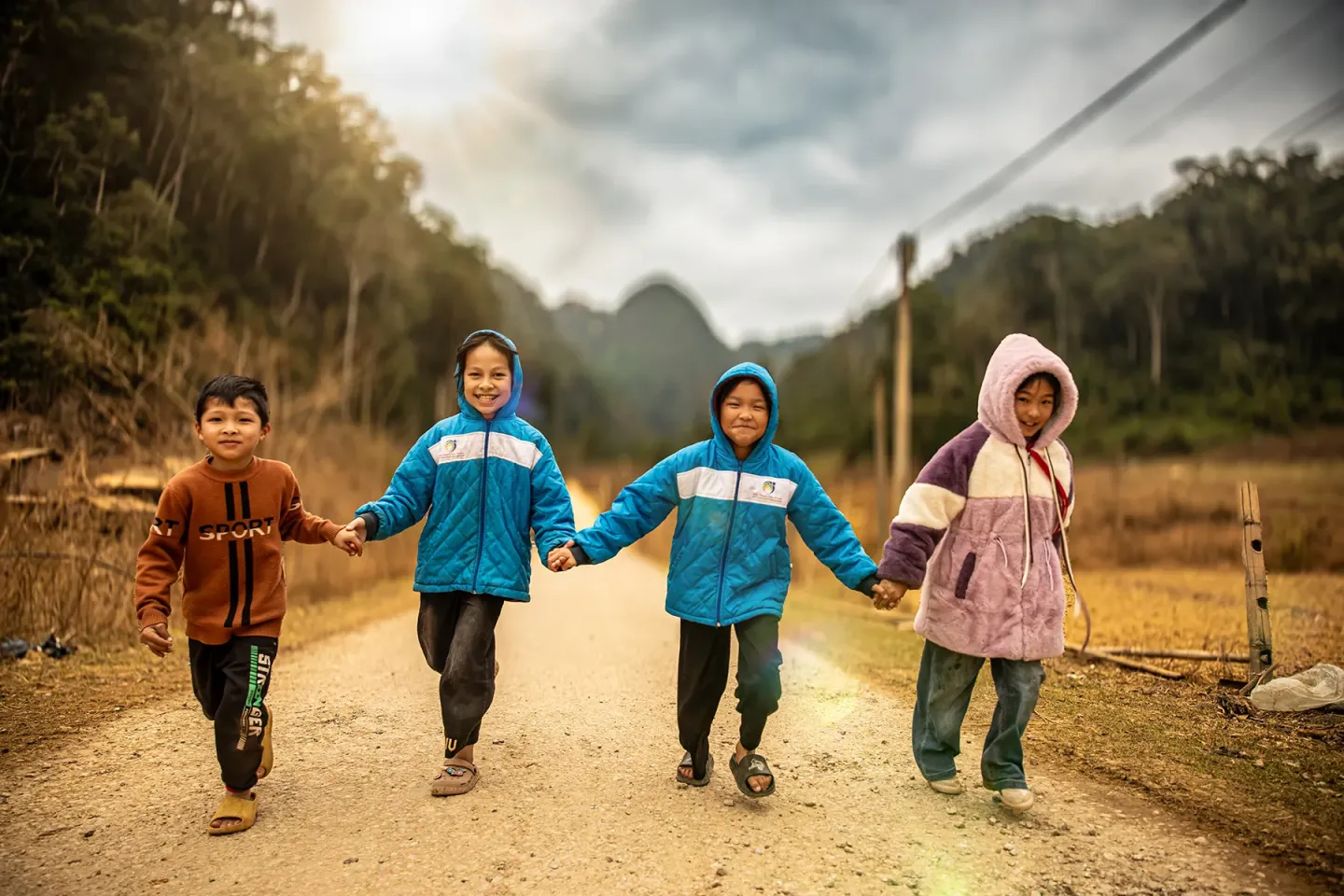 Children laughing and running. The title says: UNICEF Viet Nam Results for Children 2025.