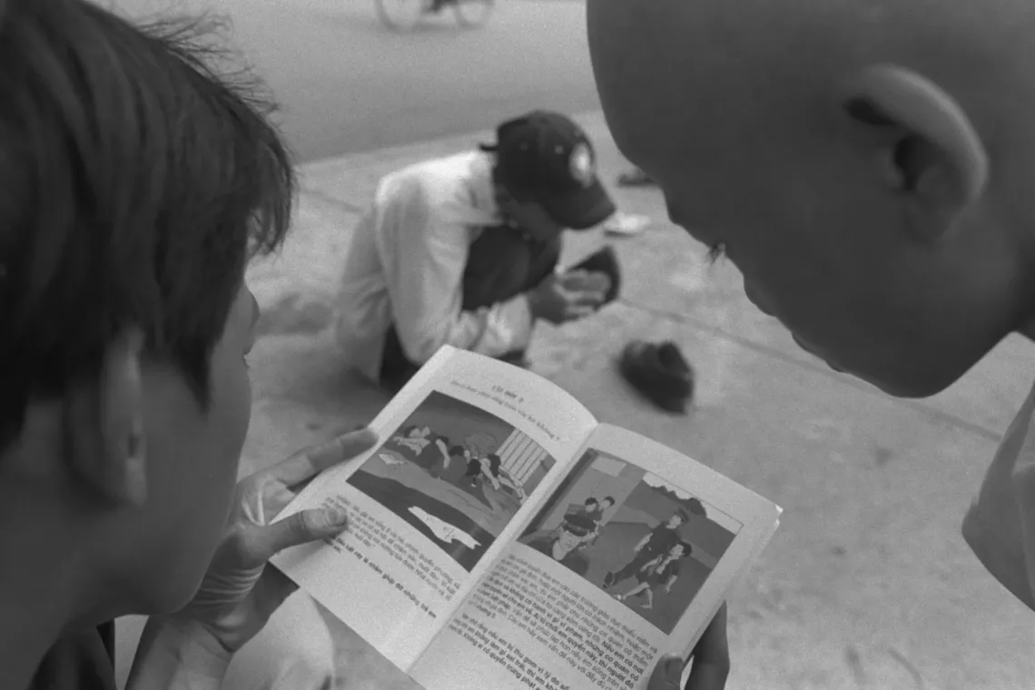 Viet Nam ratified the UN Convention on the Rights of the Child in 1990, becoming the first in Asia and second in the world to commit to this international treaty. In the photo, a UNICEF-produced booklet brings child rights to life for Vietnamese children