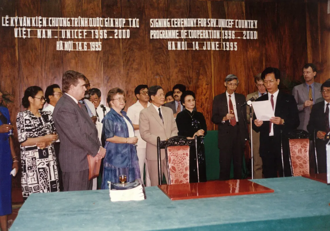 The UNICEF Viet Nam Country Programme of Cooperation for 1996&ndash;2000 came into being at a signing ceremony in Hanoi, featuring (left to right) UNICEF Representative Steve Woodhouse (left, in grey suit), UNICEF Chief of Nutrition Marijatta Tolvanen, Viet Nam Deputy Prime Minister Nguyen Khanh, Minister-Chairperson of the Committee for Protection and Care of Children Madame Tran Thi Thanh Thanh, and Vice Chair of National Planning Committee Vo Hong Phuc.  