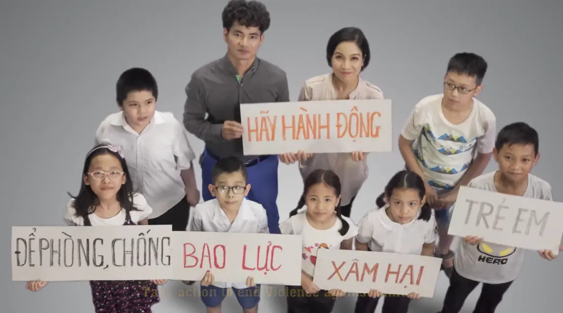 Former UNICEF Ambassador Xuan Bac with singer My Linh in a call to end violence against children in Viet Nam