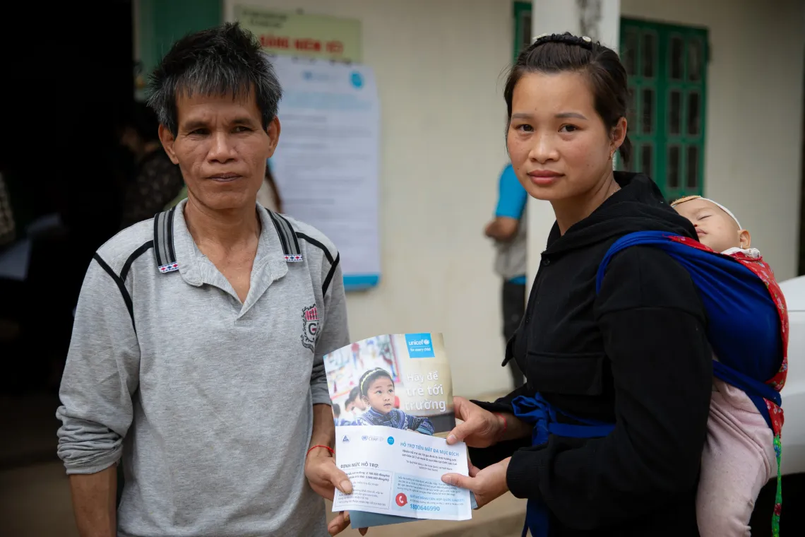Pictured left is Hoang Van Trinh, with Co Thi Van and one-year-old Hoang Thi Quynh Nhu in Lao Cai province