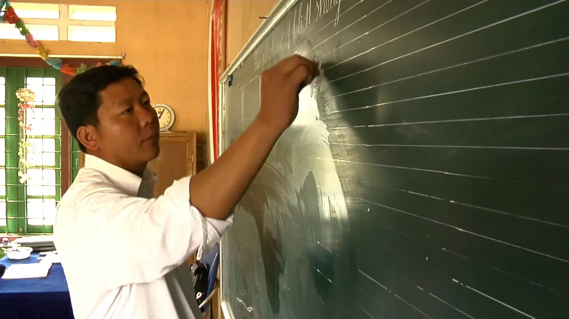Teacher Tau in class