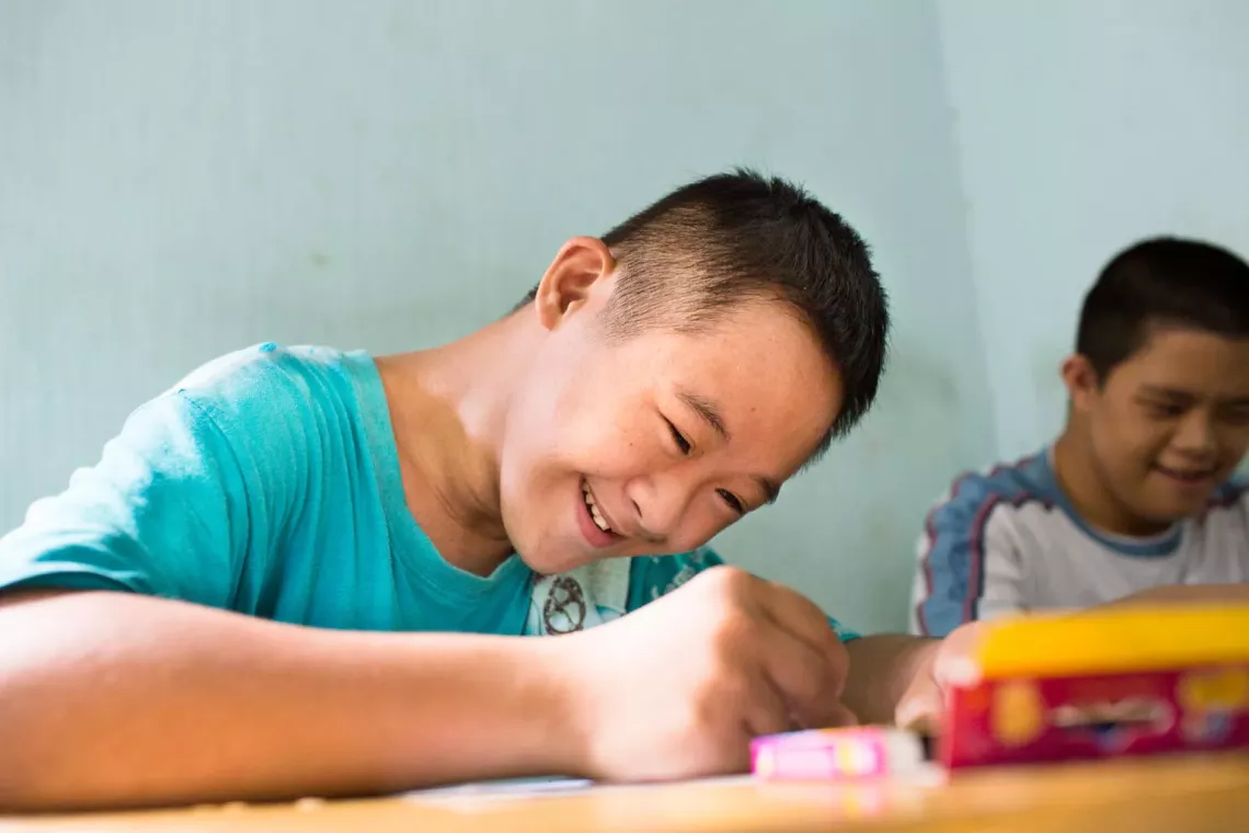 A boy drawing