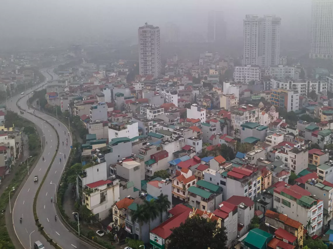 Panorama of Ha Noi city with limited visibility from a high view.