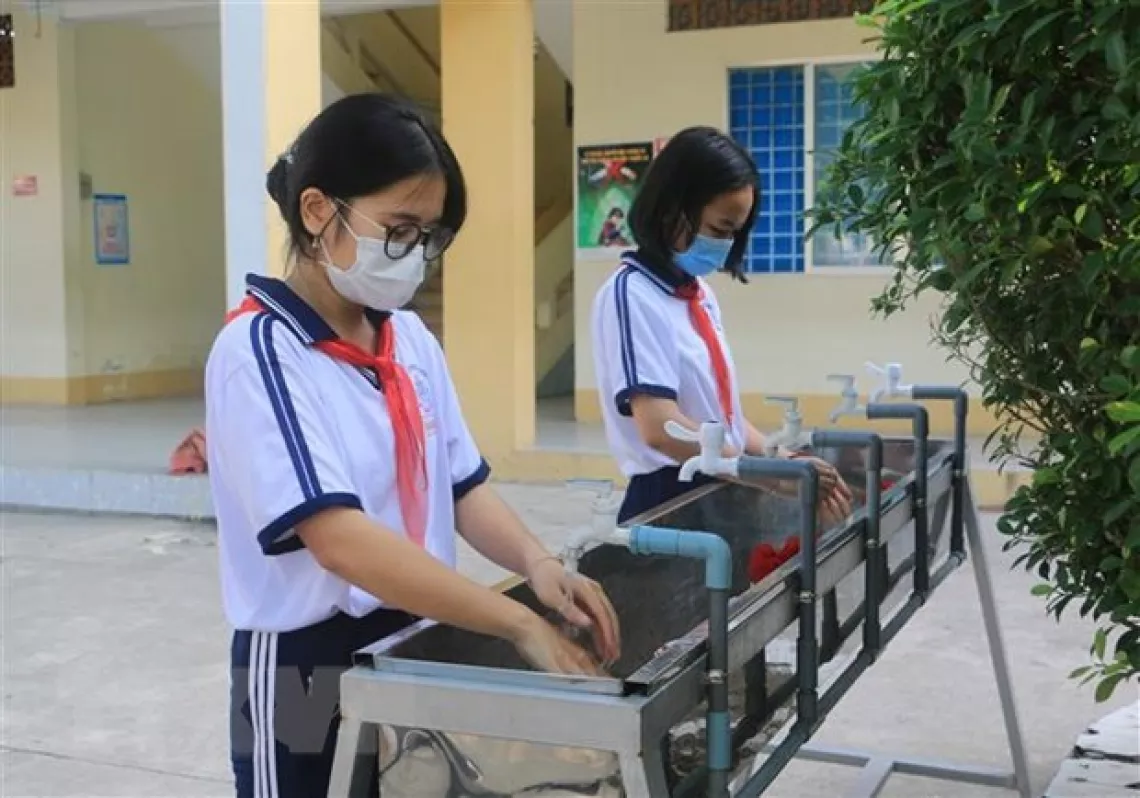 Once deemed safe, reopening schools must be considered an upmost priority. (Photo: VNA)