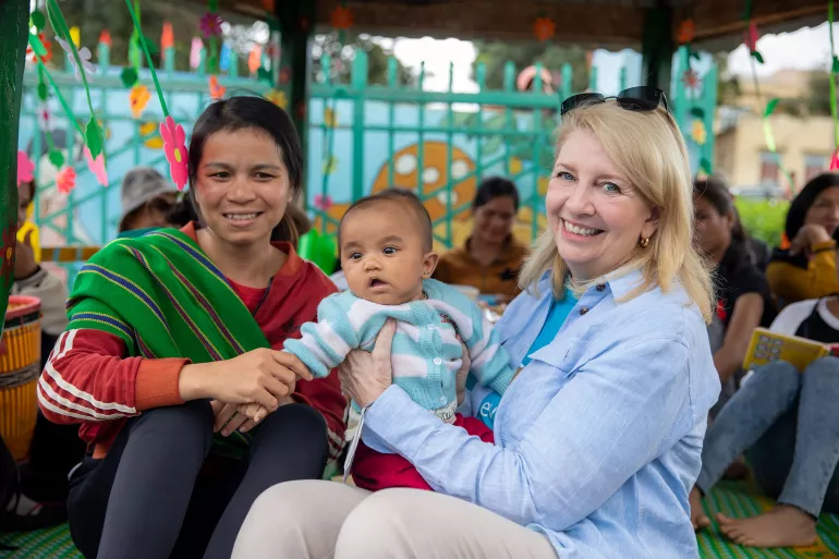 UNICEF Executive Director, Catherine Russell, with baby Luyen and his mother, Von, during her visit to a pre-school in Gia Lai province. Russell met children and parents at this school where UNICEF supports early childhood education, a critical building block for a child&rsquo;s cognitive development. But too many children living in poverty in Viet Nam remain without access to learning or had their education more dramatically disrupted by the COVID-19 pandemic. As Viet Nam works on a digital transformation that b