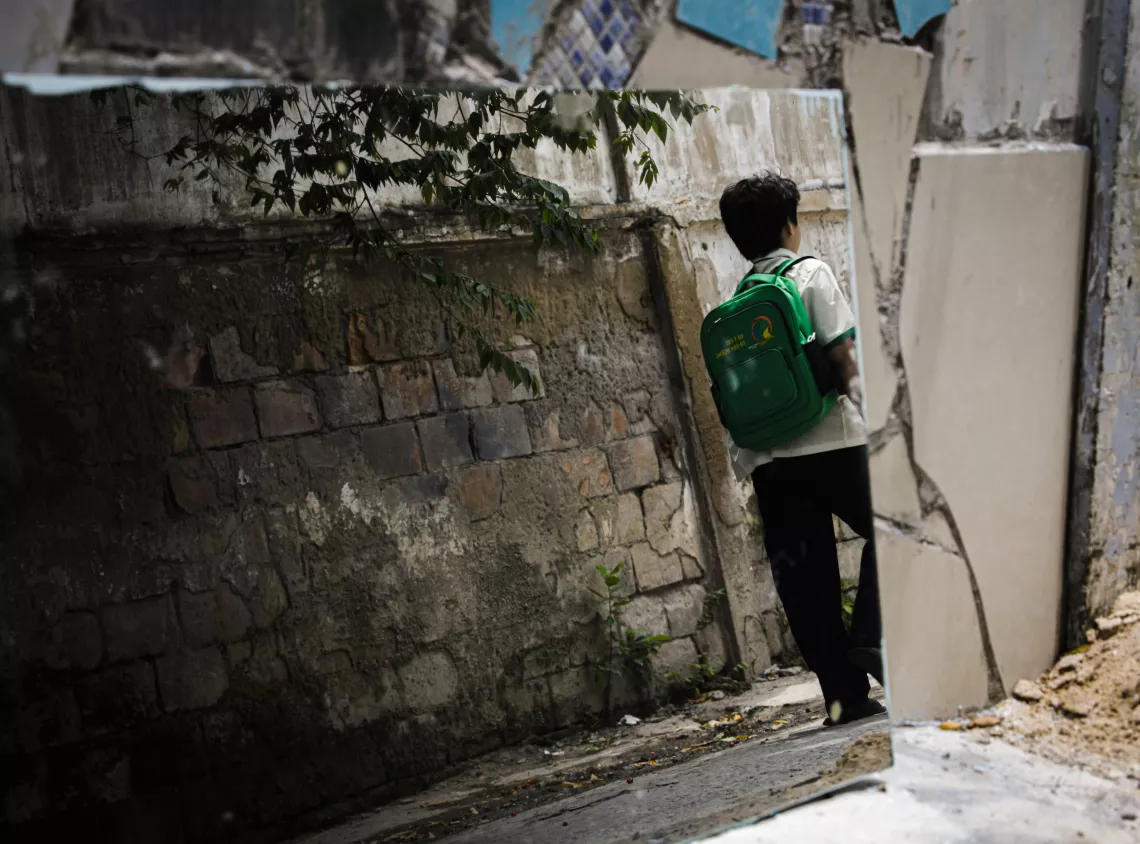 Tra Long enjoys going to school every day as his school is near his house and he can walk to school easily.