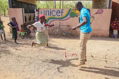 UNICEF staff playing with children in Mali 