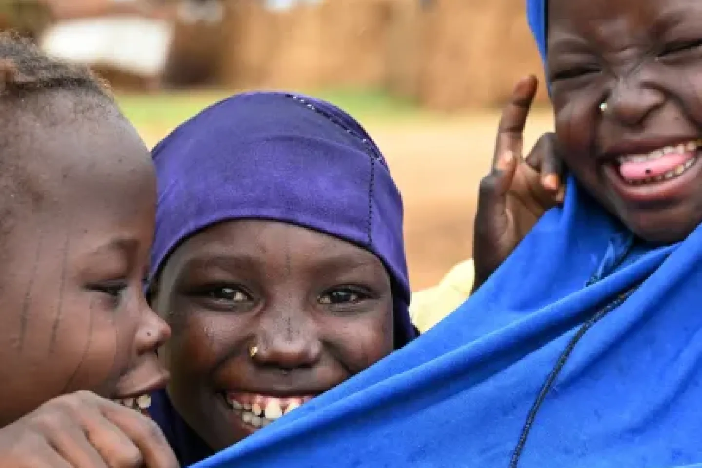 Cover image of the report : Two girls laughing 