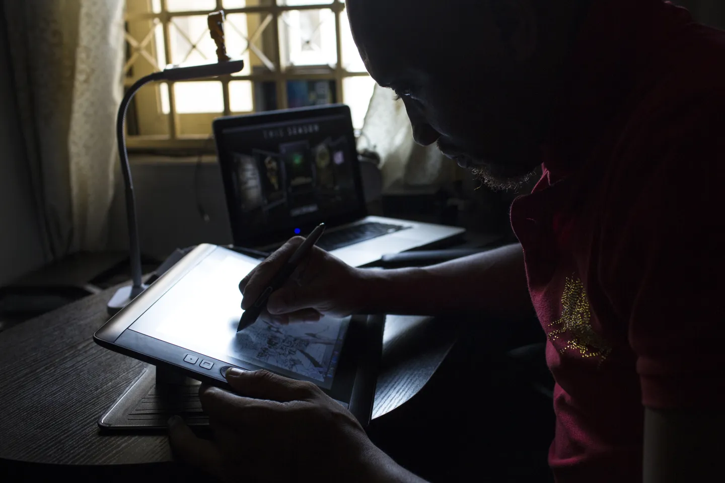 Jide Martins drawing comic books