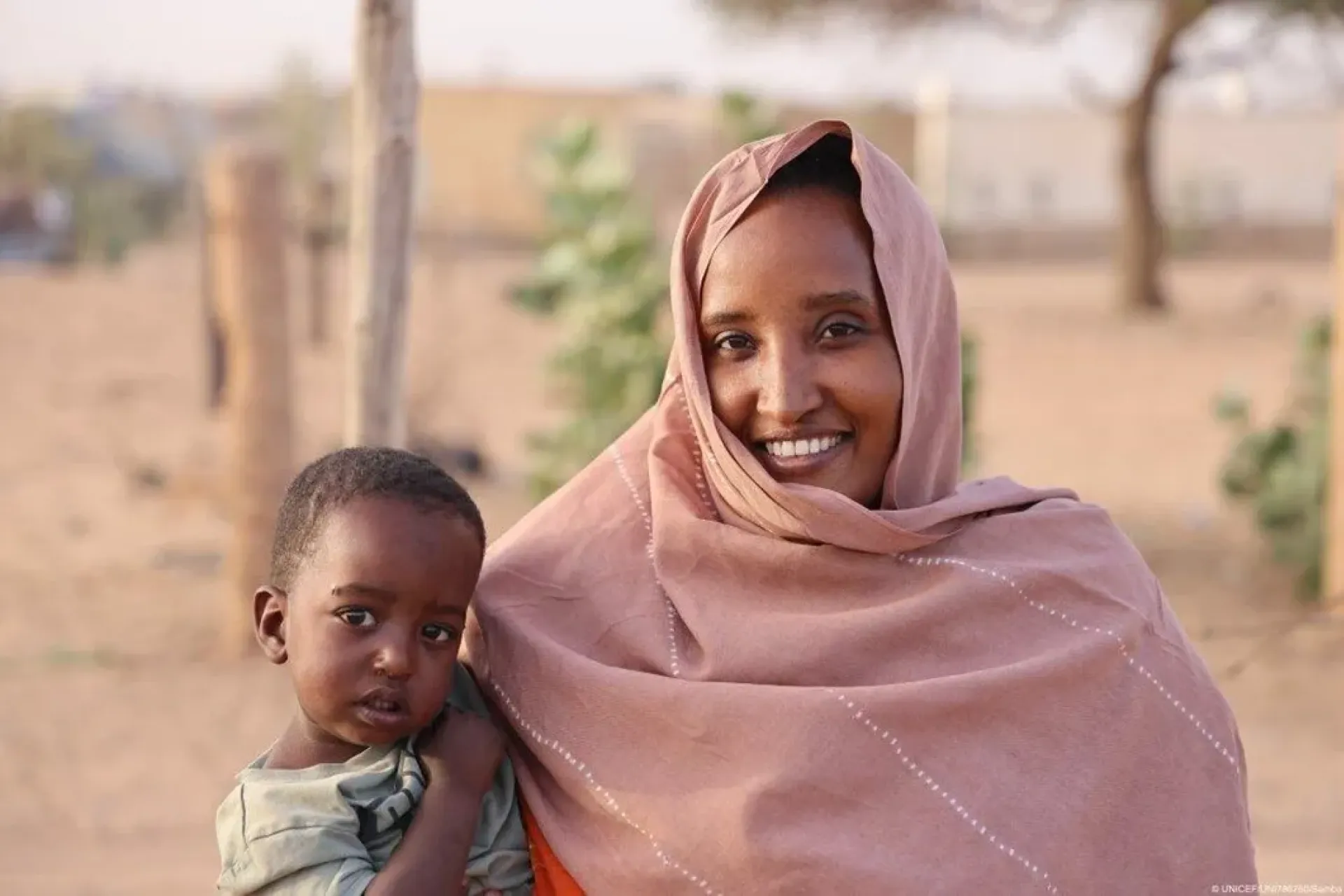 Woman holding a child 