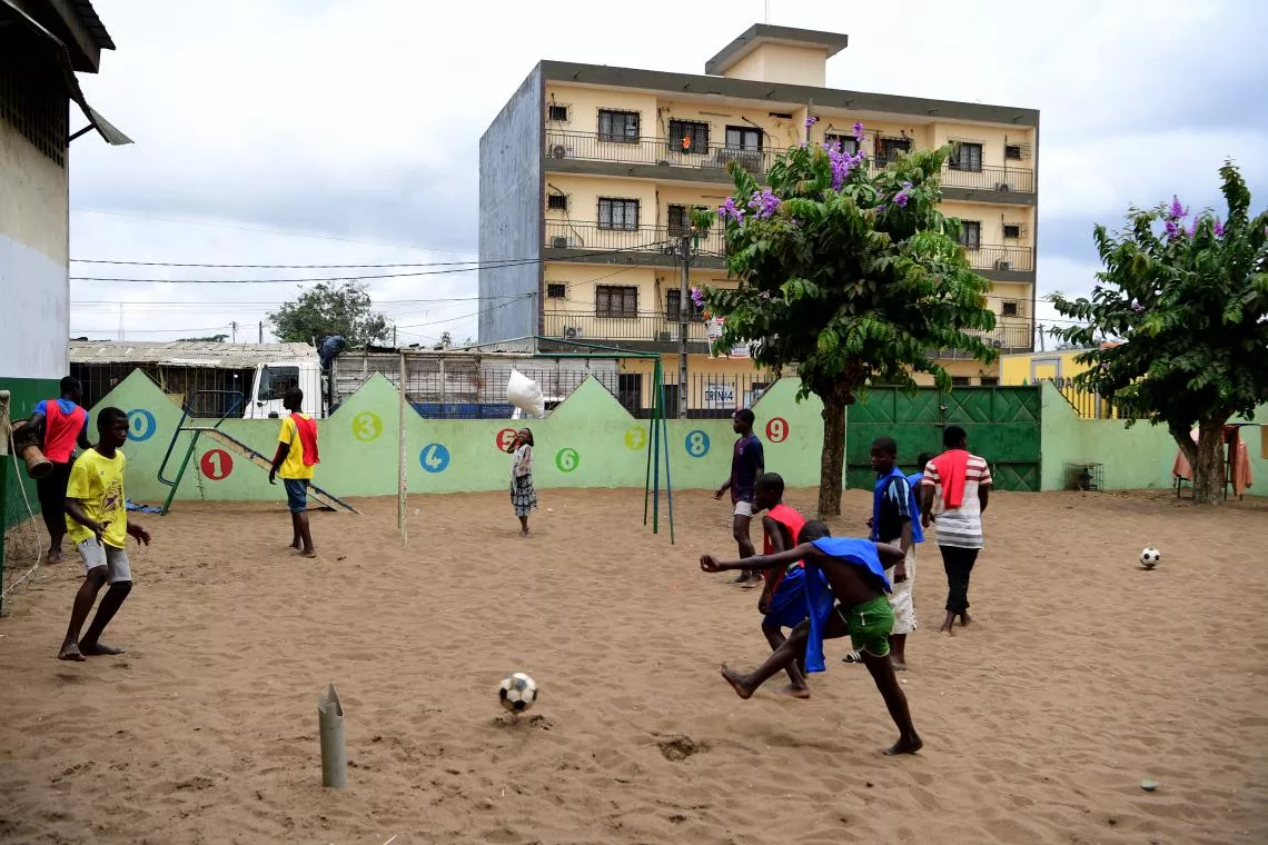 Children play outside at a protection centre in Abobo, a suburb of Abidjan, Côte d’Ivoire.