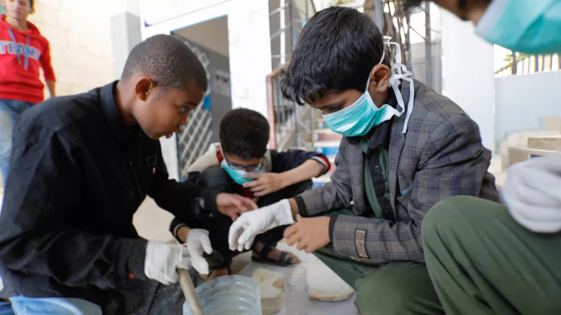 boys working on a project