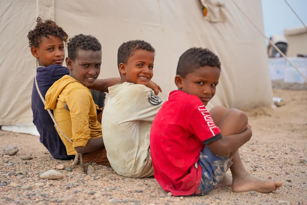 Group of children smiling to the camera