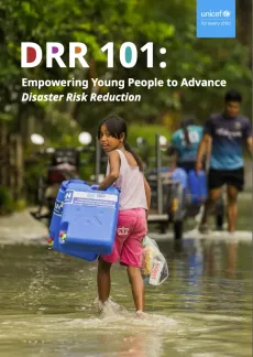 A cover of the DRR 101 Facililtator's Manual showing a young girl walking in flood water carrying a water container