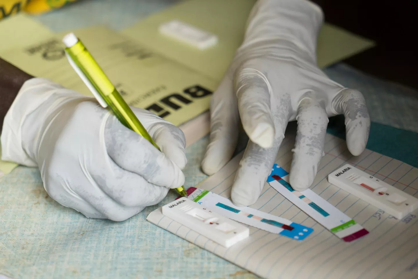 Health officer examines HIV tests