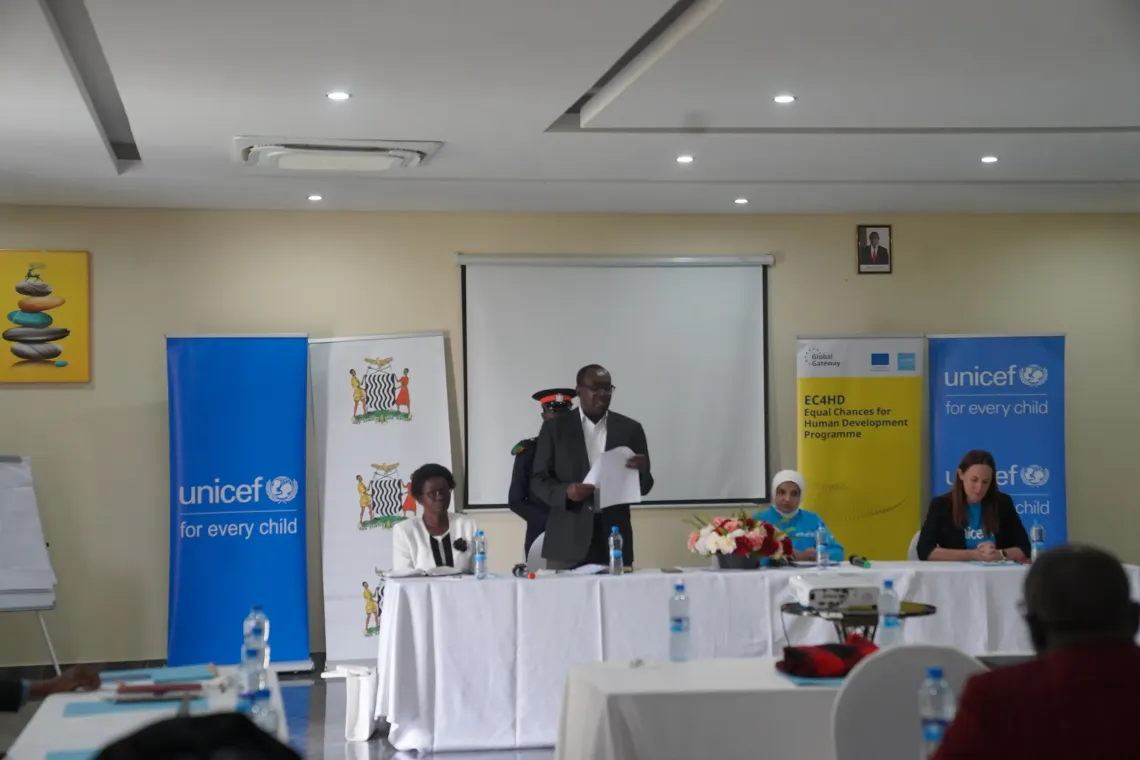 Participants attend a health systems presentation during a UNICEF-supported meeting in Chifunabuli, Luapula Province.