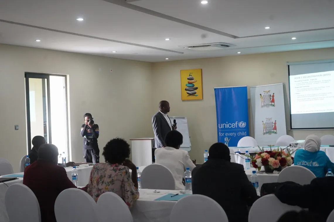 District officials and UNICEF representatives participate in a programme review meeting in Chifunabuli, Luapula Province.