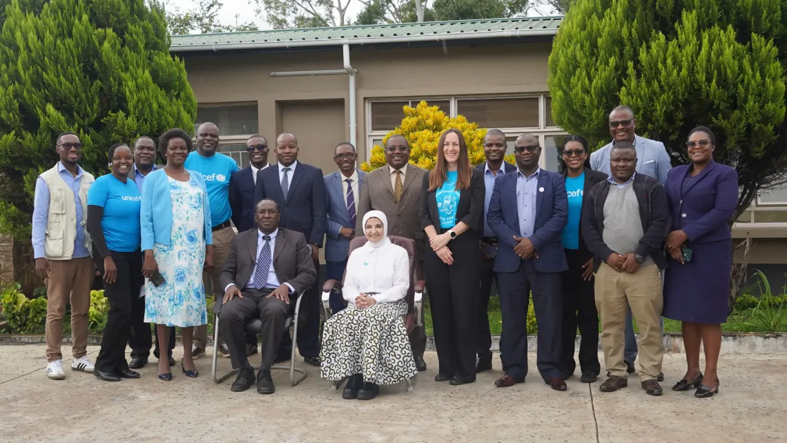UNICEF Zambia Representative Dr. Saja Farooq Abdullah poses for a group photo with provincial government officials, UNICEF staff and partners during a familiarisation mission in Luapula Province.