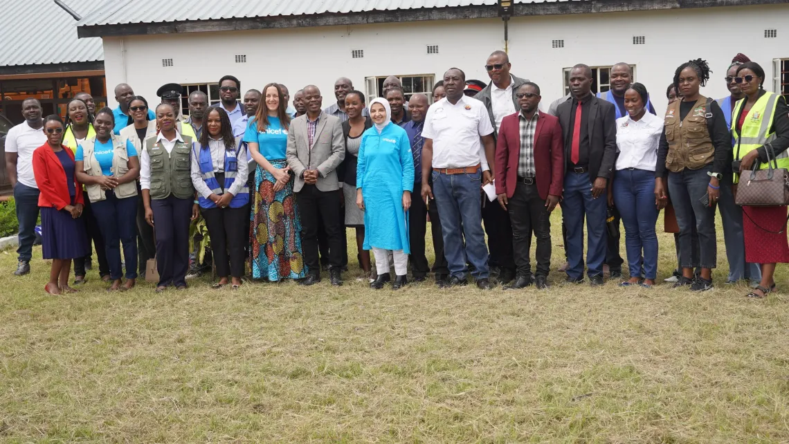 Dr. Saja Farooq Abdullah, UNICEF Zambia Representative, poses for a group photo with government officials, partners and frontline workers during her familiarisation mission in Chifunabuli District, Luapula Province.