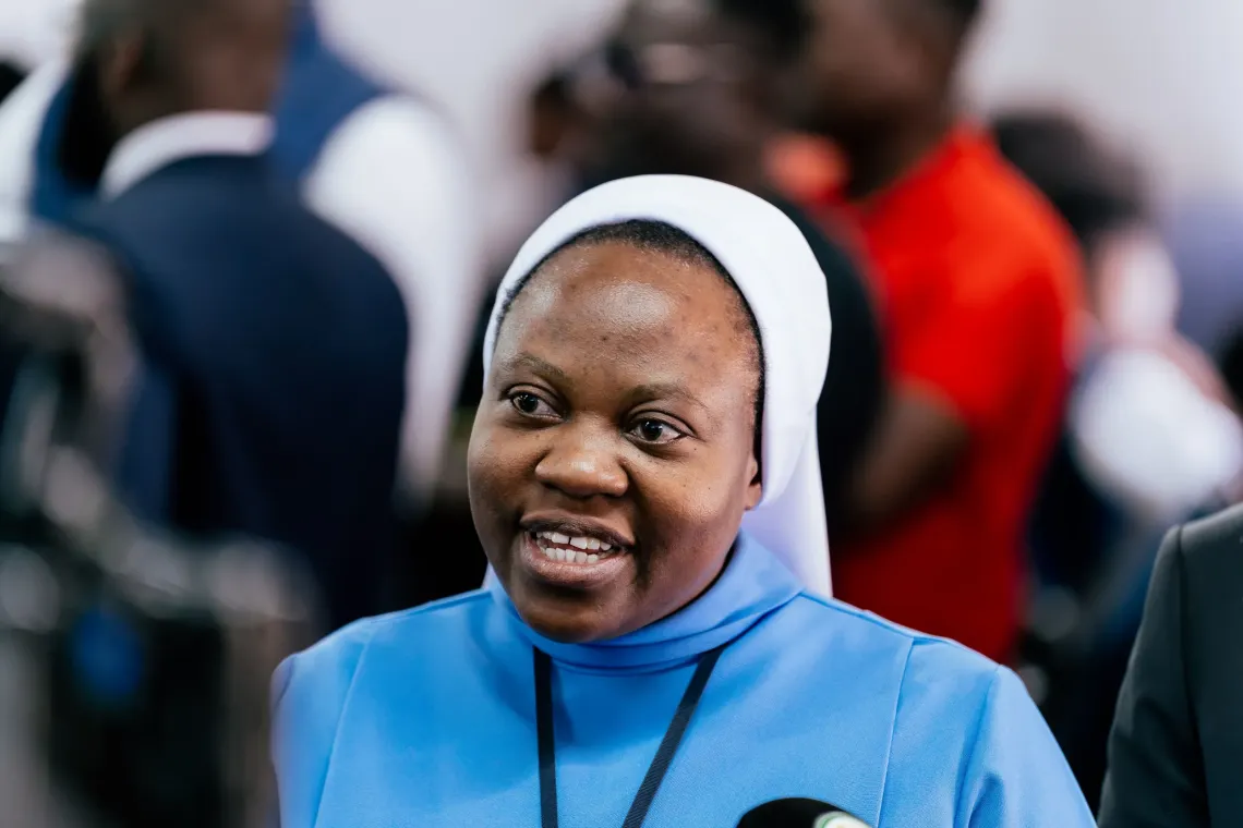 Sr. Matilda Soloka, Headteacher of St. Monica's Girls' Secondary School, speaks during the school visit.